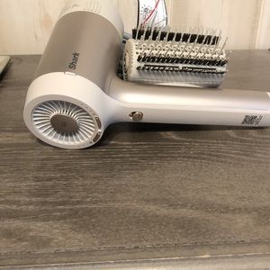 Woman’s hair dryer by Shark.  Excellent condition.